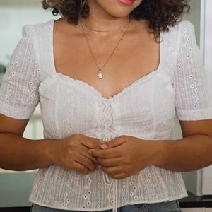 Sweetheart eyelet peplum white cropped top.